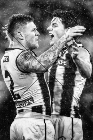 Jordan De Goey and Pat Lipinski celebrate in the rain