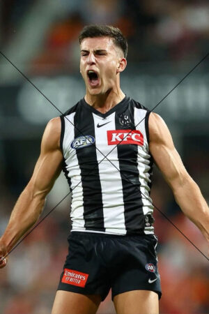 Nick Daicos in passionate goal celebration