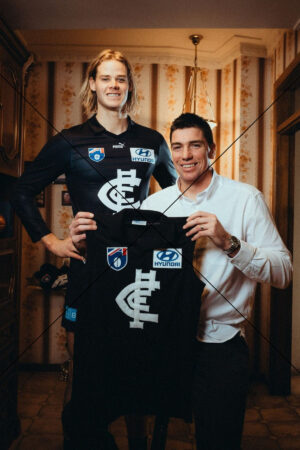 Tom De Koning and Matthew Kreuzer Show off the Carlton Heritage Guernsey Photo Print 6" x 4"