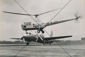 Helicopter Flying Over Classic Passenger Plane Photo Print 6" x 4"
