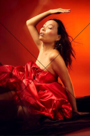 Dami Im in Red Satin Dress Against Fiery Background Photo Print 6" x 4"