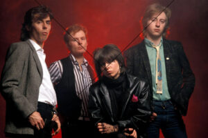 The Pretenders Red Background Group Portrait 6" x 4"