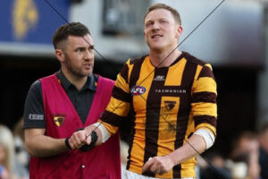 James Sicily Leaves Field Injured Hawthorn Hawks AFL Photo Print 6" x 4"