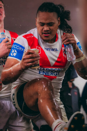 Luciano Leilua Splashing Drink in NRL Locker Room 6" x 4" Photo Print