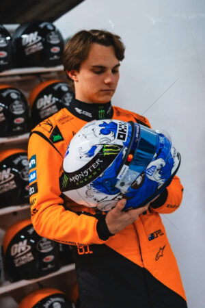 Oscar Piastri Examining Helmet in Pit Room 6" x 4" Photo Print