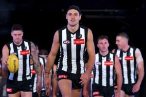 Darcy Moore Walking with Captain's Confidence 6" x 4" Photo Print