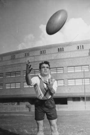 Clive Churchill Reaching for Football Mid-Air 6" x 4" Photo Print