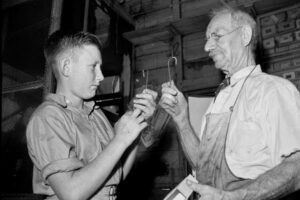 Hartley Spurr and Customer with Fishing Hooks 6" x 4" Photo Print