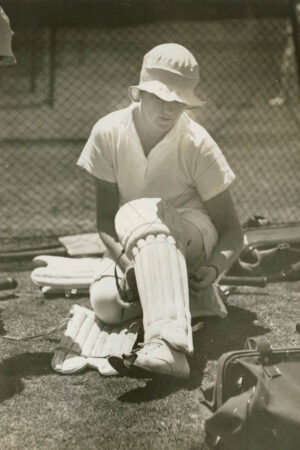 Miss Archdale Putting on Cricket Pads 6" x 4" Photo Print