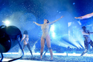 Beyonce Performing in Rain with Arms Raised 6" x 4" Photo Print