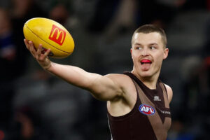 Jack Ginnivan Taunting Bulldogs with Ball in Hand 6" x 4" Photo Print