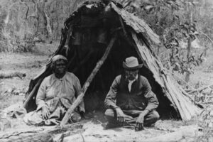 Two People Sitting In Front Of A Bush Hut Queensland 6" x 4" Photo Print