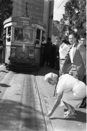Woman Places Coin On Rails Last Tram Day 6" x 4" Photo Print