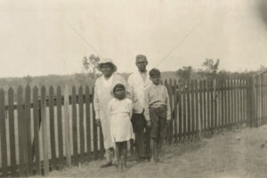 Family Standing By Picket Fence Woorabinda 6" x 4" Photo Print