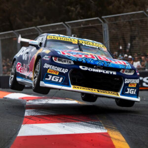 V8 Supercars - Broc Feeney Red Bull Camaro Flying Over Chicane 6" x 6" Photo Print
