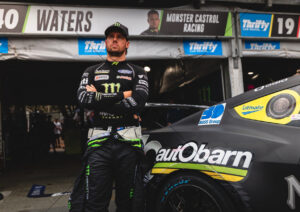 Cam Waters Stands Beside Monster Mustang A4 Poster Print