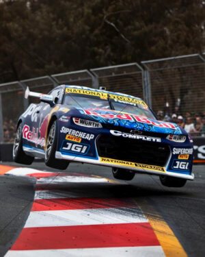 Supercars Broc Feeney Red Bull Camaro Flying Over Chicane. Large10" x 8" Photo Print