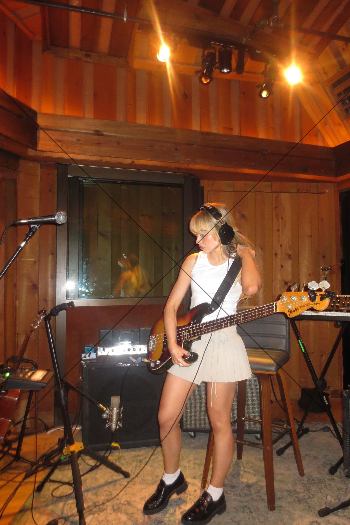 Sabrina Carpenter playing bass guitar in studio 6"x 4" Photo Print