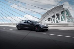 Tesla Model 3 Performance On City Bridge Run 6" x 4" Photo Print