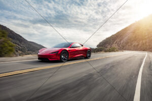 Tesla Roadster Red On Coastal Highway 6" x 4" Photo Print