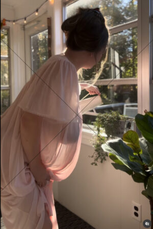 Woman Watering Indoor Plants In Soft Pink Gown 6" x 4" Photo Print