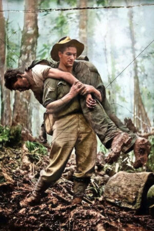 Leslie 'Bull' Allen carries wounded soldier New Guinea 6" x 4" Photo Print