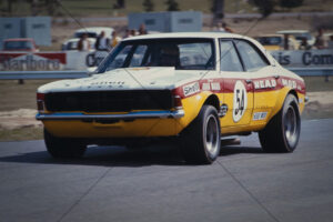 John Mann Shell Ford Falcon racing at Symmons Plains 6" x 4" Photo Print