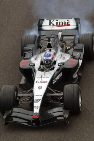 Kimi Raikkonen smoking tyres in McLaren F1 car 6" x 4" Photo Print