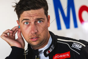 Chaz Mostert surprised garage portrait with earplugs 6" x 4" Photo Print