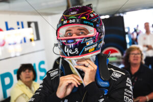 Chaz Mostert adjusting helmet straps before Supercars race 6" x 4" Photo Print