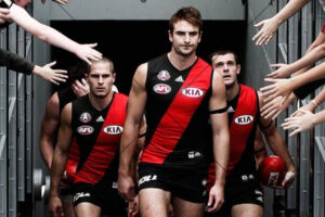 Jobe Watson Leads Teammates Through Fan Tunnel 6x4 Photo Print