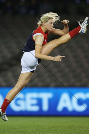 Tayla Harris Side-On Drop Punt Action 6x4 Photo Print