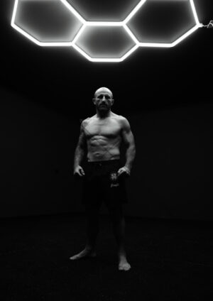 Alexander Volkanovski Full Body Hex Lights Wide Frame A4 Poster Print