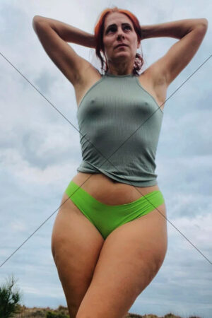 Portrait Of Woman In Green Briefs And Tank Top Outdoors 6x4 Photo Print