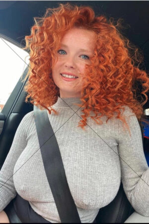 Curly Redhead Woman Smiling In Car Seat Portrait 6x4 Photo Print