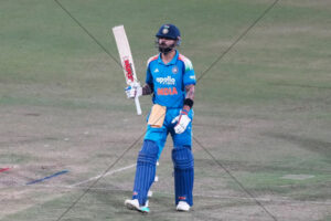 Virat Kohli Bat Raised On Pitch After Milestone Knock 6x4 Photo Print