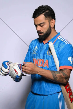 India Cricket Star Adjusting Gloves With Bat In Studio Shot 6x4 Photo Print