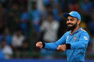 India Cricket Star Smiling Gesture On Field In Blue Jersey 6x4 Photo Print