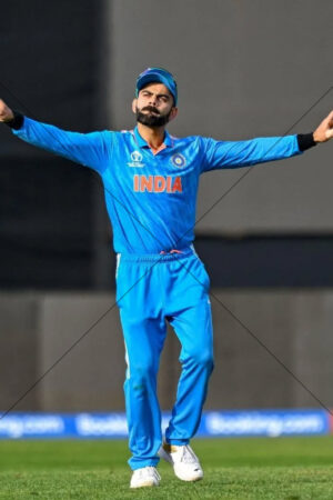 India Cricket Star Wide Arms Celebration On Ground In Blue 6x4 Photo Print